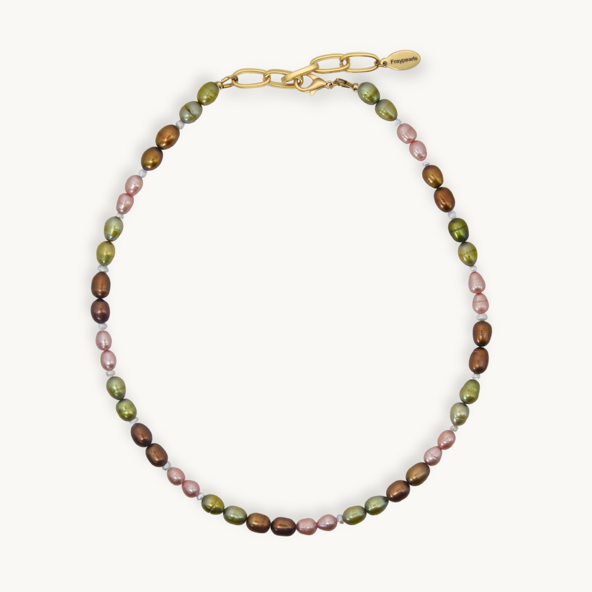 A necklace with alternating olive green, dusty pink, and brown baroque pearls, finished with a gold-tone lobster clasp and a small gold brand tag, shown on a light cream background.