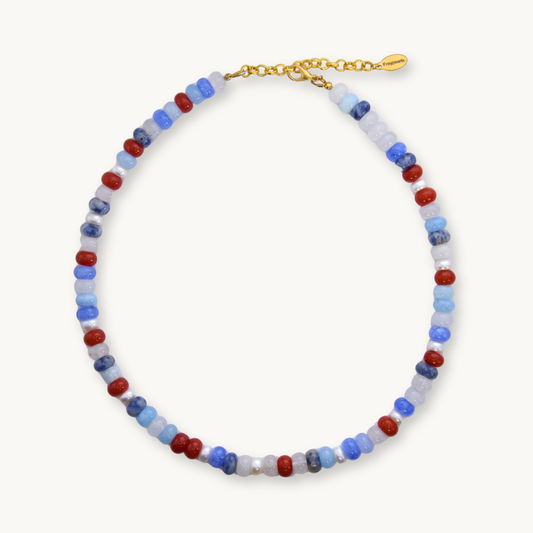 Multicolored beaded necklace with a gold clasp on a white background