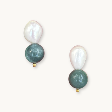 Pair of earrings with pearls and jade on a white background