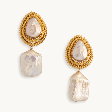 Elegant dangling earrings feature teardrop pearls in woven gold settings, with irregular baroque pearl drops, exuding a luxurious and artistic charm.