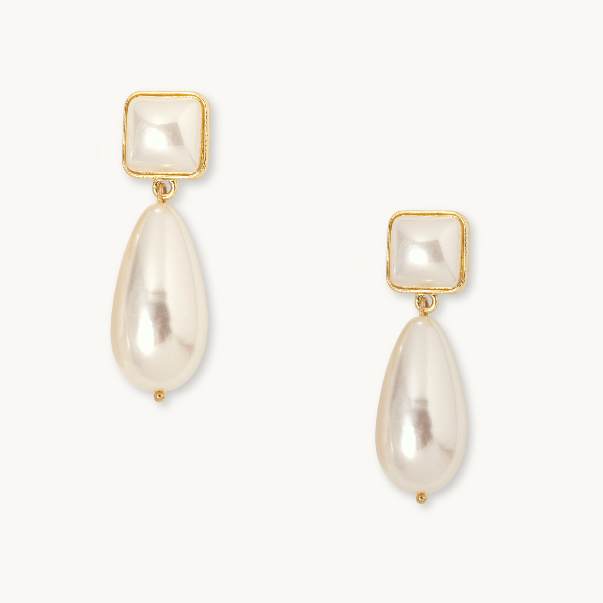 Elegant pearl drop earrings with gold trim, featuring a square pearl stud and teardrop pearl dangle. The design is classic and sophisticated.
