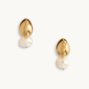Gold and pearl drop earrings on a white background. The design features a smooth gold teardrop shape above an irregularly shaped white pearl.