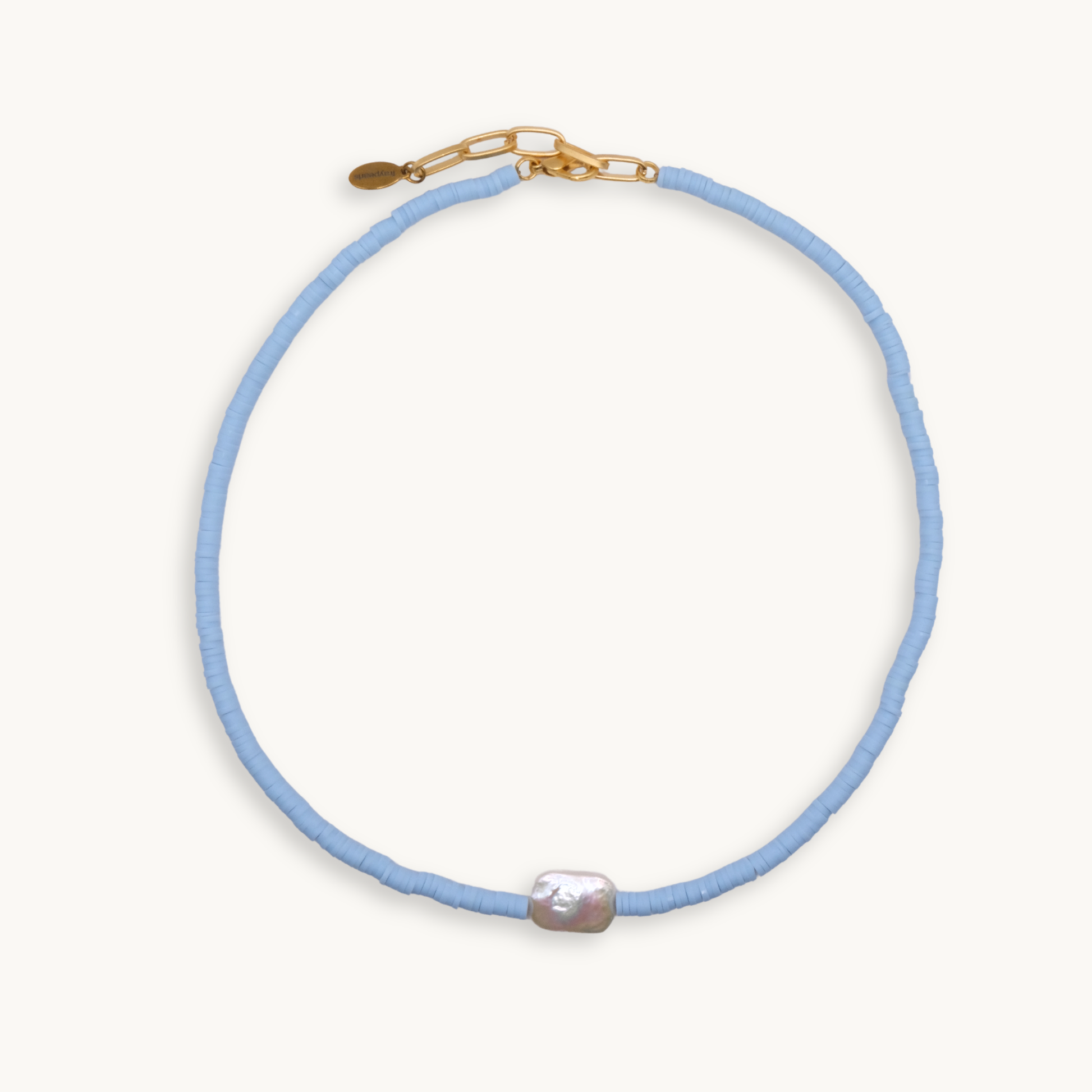 Light blue beaded necklace with a pearl pendant on a white background
